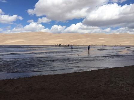 river going through the great sand dunes national park colorado