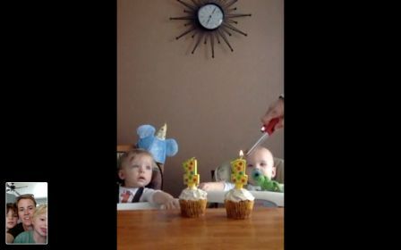 Liz and her children on Skype celebrating the twins first birthday.